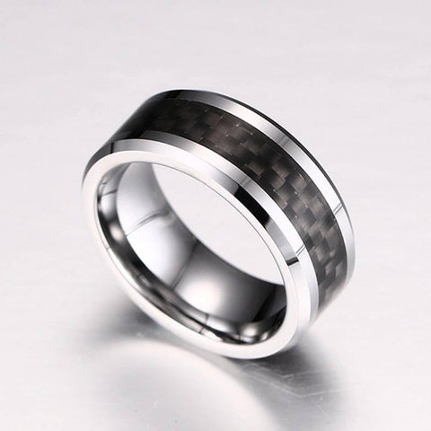 Image of Tungsten Men's Wedding Band with Black Carbon Fiber Inlay and Beveled Edges at an Angle | The Executive
