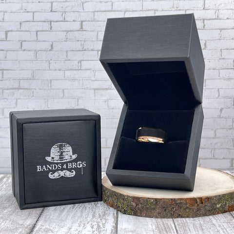Image of Rose Gold Men's Tungsten Wedding Band with Beveled Edging displayed in a black Bands 4 Bros ring box | The Adonis