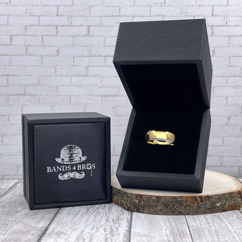 Image of Gold Tungsten Men's Wedding Band with Silver Edging and Domed Design in a black Bands 4 Bros ring box | The Doubloon