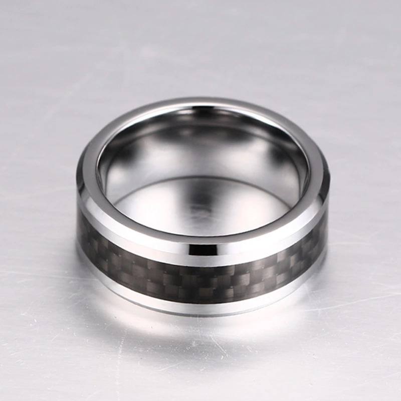 Tungsten Men's Wedding Band with Black Carbon Fiber Inlay and Beveled Edges Laying Flat | The Executive