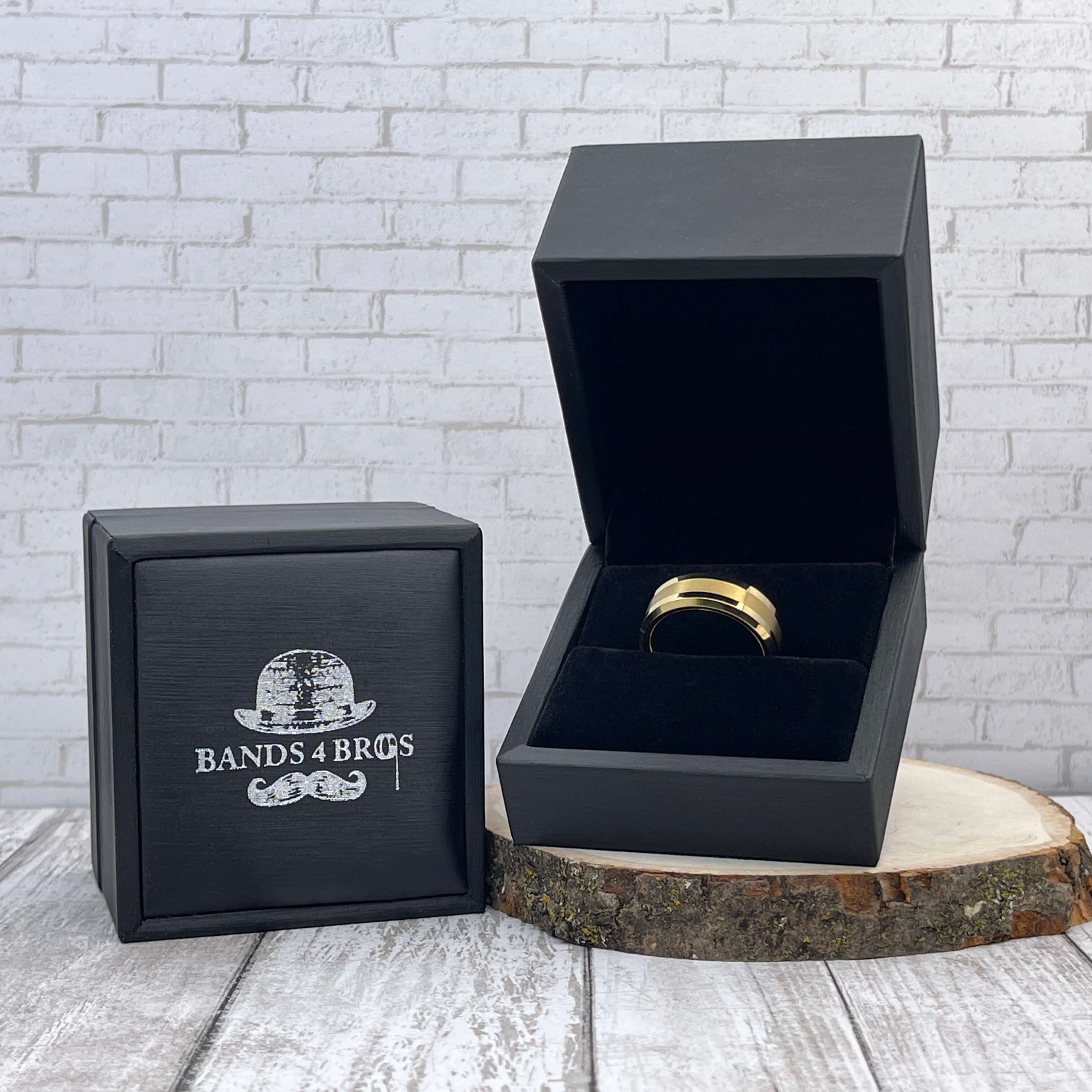 Gold Men's Tungsten Wedding Band with Beveled Edging displayed in a black Bands 4 Bros ring box | The Arthur