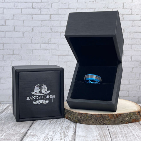 Image of Blue Tungsten Men's Wedding Band with Black Carbon Fiber Inlay and Beveled Edges in a Black Bands 4 Bros Ring Box | The Speedway