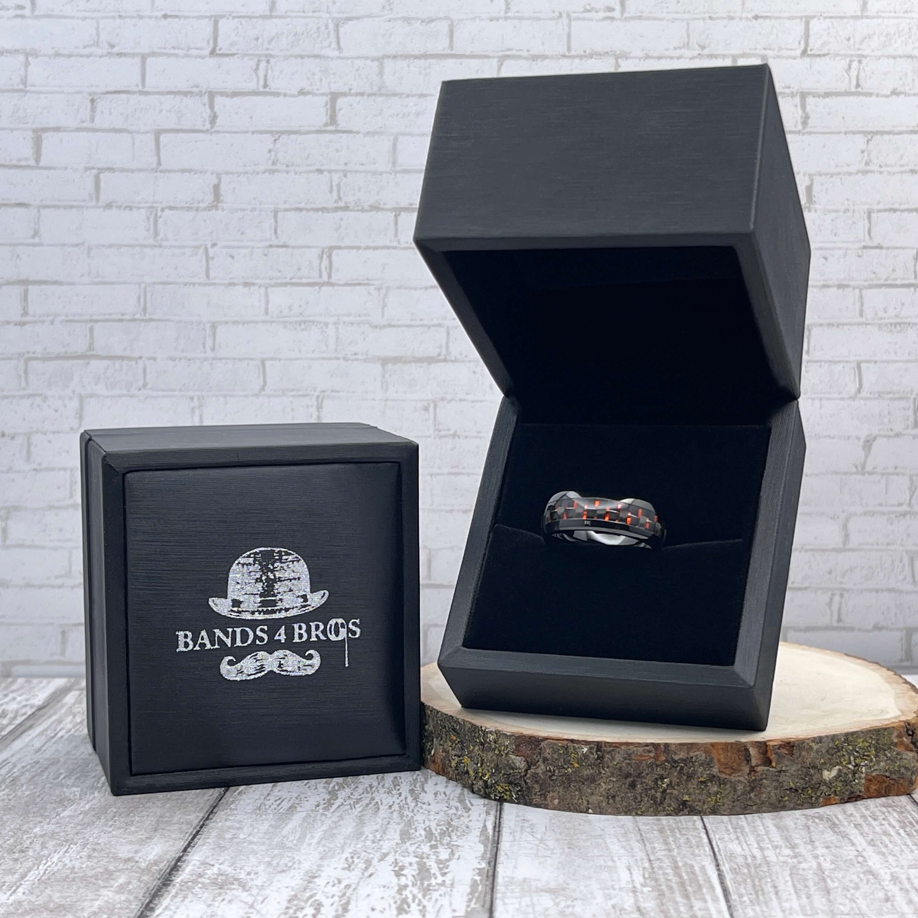 Black Tungsten Men's Wedding Band with Red Carbon Fiber Inlay  in a black Bands 4 Bros ring box  | The Commander 