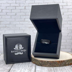 Black Men's Tungsten Wedding Band with Beveled Edging displayed in a black Bands 4 Bros ring box | The Aramis