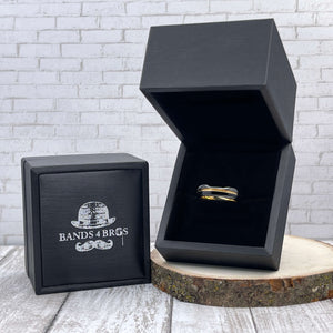 Black Men's Tungsten Wedding Band with Gold Inlay displayed in a black Bands 4 Bros ring box | The Bond