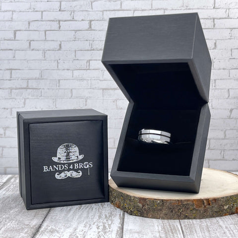 Image of Men's Wedding Band With Black Inlay in a black Bands 4 Bros ring box | The Diplomat