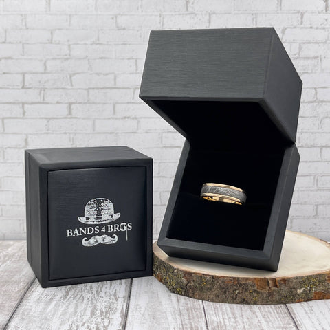 Image of The Aries: 14K Yellow Gold Men's Ring with Meteorite Inlay. Seated in Bands 4 Bros ring box.
