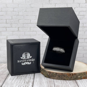 Black Zirconium Men's Wedding Band With Meteorite Inlay in a Black Bands 4 Bros Ring Box | The Draco 