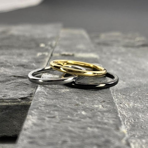 Image of Three Thin Men's Tungsten Wedding Bands on Slate | The Arthur