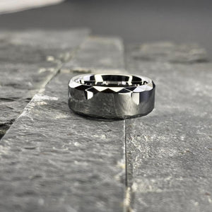 Tungsten Men's Wedding Band with a Geometric Design and High Gloss Finish Close Up on Slate | The Hammer