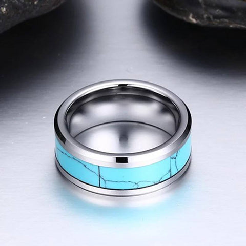 Image of Tungsten Men's Wedding Band with Turquoise Inlay and Beveled Edges Laying Flat | The Trailblazer